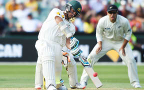 Mitchell Starc hits a boundary during day 2 of the 3rd cricket test match between New Zealand Black Caps and Australia. Saturday 28 November 2015.