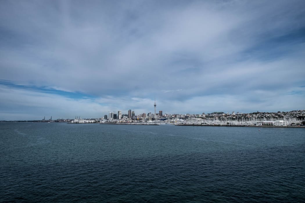 Auckland cityscape over looking water from the Auckland harbour bridge