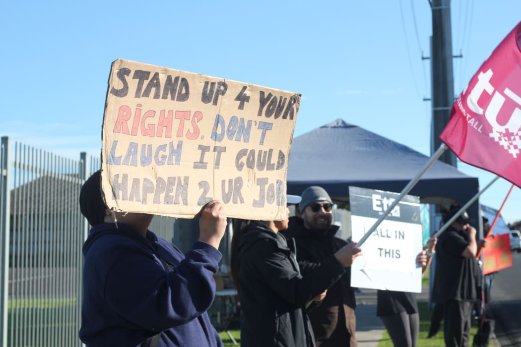 Picket signs outside Temperzone