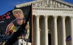 Supporters of US President Donald Trump participate in the Million MAGA March  to protest the outcome of the 2020 presidential election in front of the US Supreme Court on December 12, 2020 in Washington, DC.