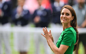 Britain's Catherine, Princess of Wales applauds during the trophy ceremony after the men's singles final tennis match between Spain's Carlos Alcaraz and Serbia's Novak Djokovic on the last day of the 2023 Wimbledon Championships at The All England Tennis Club in Wimbledon, southwest London, on July 16, 2023. (Photo by Glyn KIRK / AFP) / RESTRICTED TO EDITORIAL USE