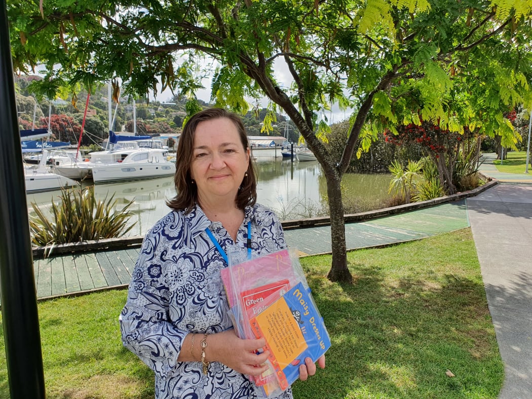 Heather Edmeades delivers books at playgrounds for young Northlanders to find and read.