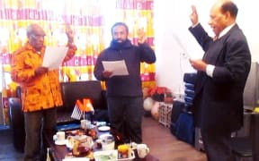 Jeffrey Bomanak (middle) takes oath as chairman of the Free Papua Movement (OPM) from Jacob Prai (right) in Sweden in 2017.