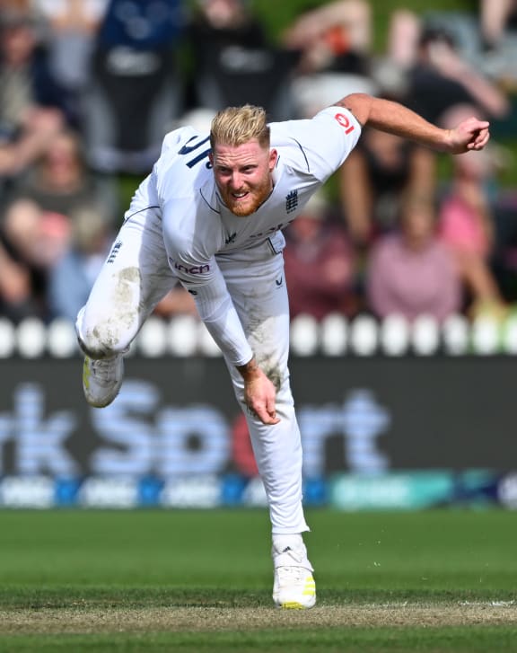 England captain Ben Stokes bowling.