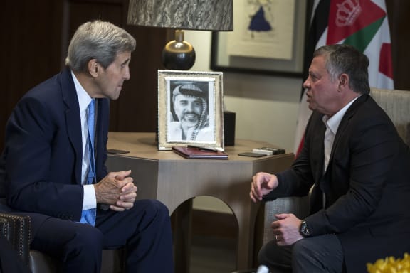 US Secretary of State John Kerry (L) holds a meeting with Jordan's King Abdullah II at the Royal Palace in the Jordanian capital, Amman.