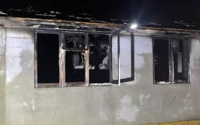 The burnt Ōrākei house that a man was rescued from.