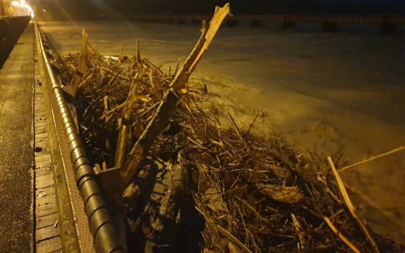 Debris banked up on Ashburton River Bridge