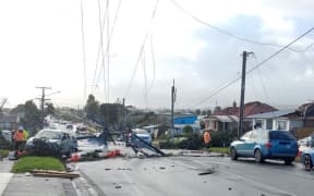 Downed powerlines and damaged roofs after yesterday's tornado.