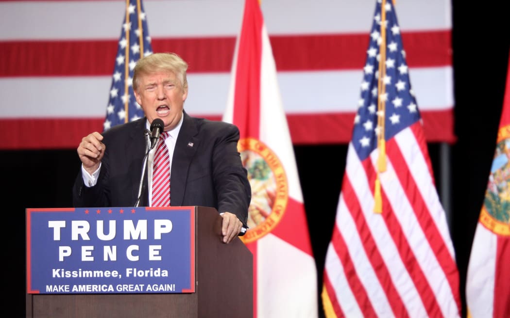 Republican presidential candidate Donald Trump addresses supporters during a campaign rally in Florida on August 11, 2016.