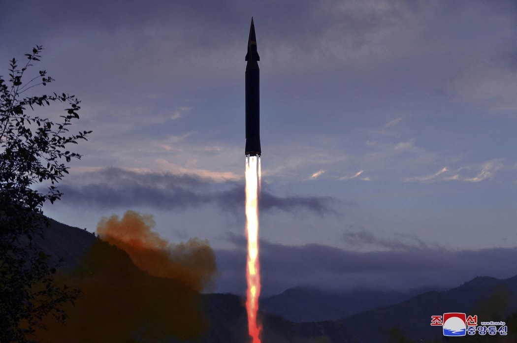 This photo, released from North Korea's official news agency, shows the Academy of Defence Science of the DPRK test-firing a Hwasong-8 hypersonic missile.