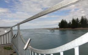 Boat entering Port Motueka.
