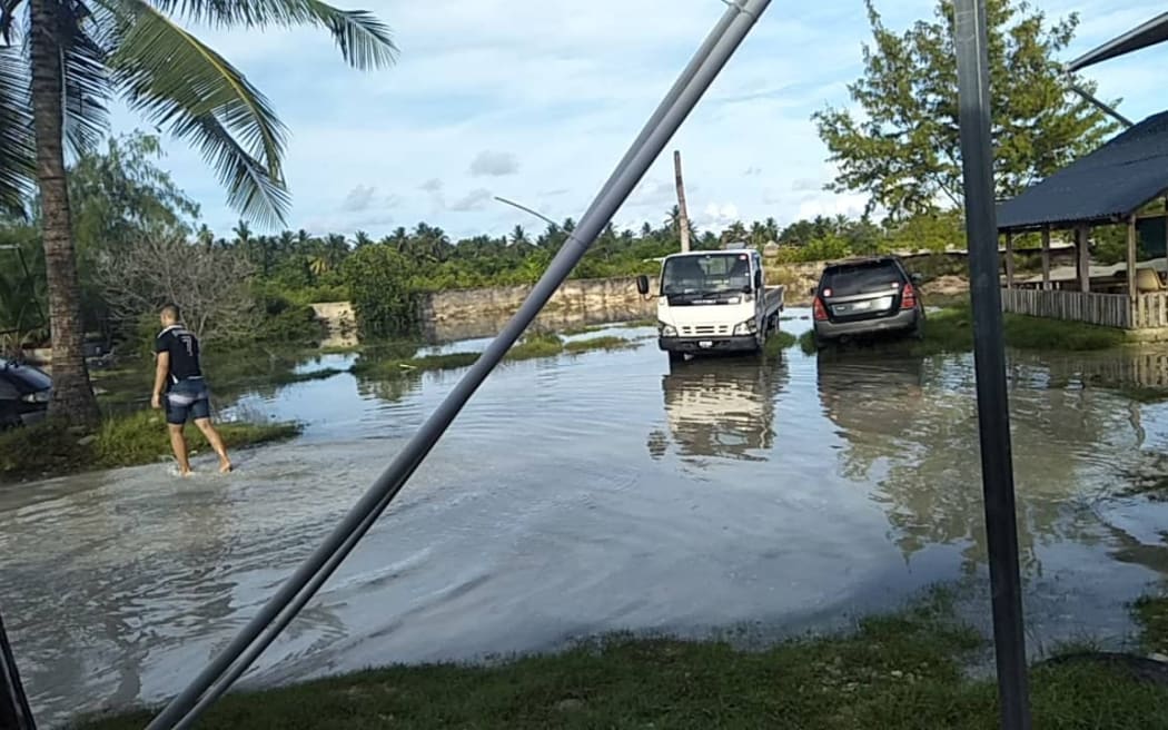 Tarawa street scene with king tide, Friday 30 August 2019.