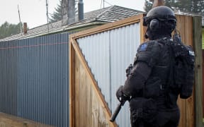 Armed police officers during an operation.