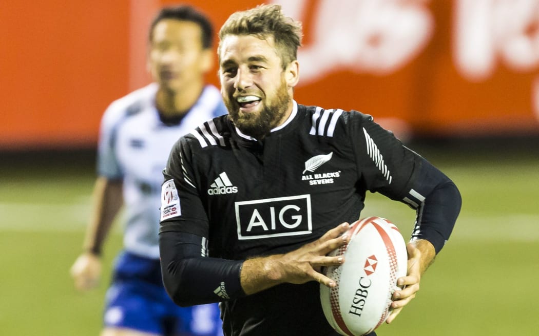 Kurt Baker smiles as he scores against Russia.