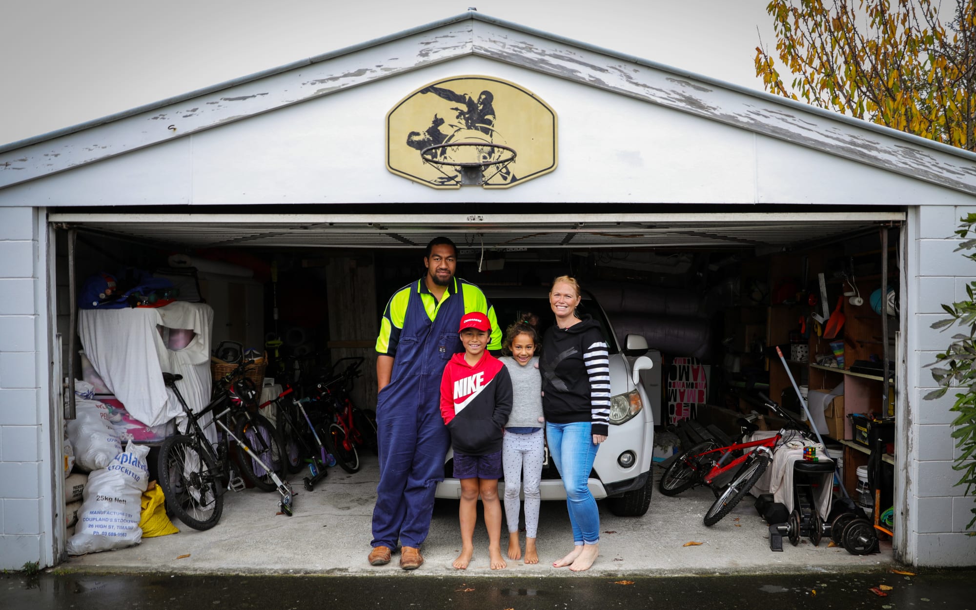 Portraits of people in lockdown. BJoe and Kelly Taulangovaka and their children photographed at their home during lockdown Level 3.