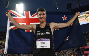 Gold medallist New Zealand's Hamish Kerr celebrates after the men's high jump final athletics event at the Alexander Stadium, in Birmingham on day six of the Commonwealth Games in Birmingham, central England, on 3 August, 2022.