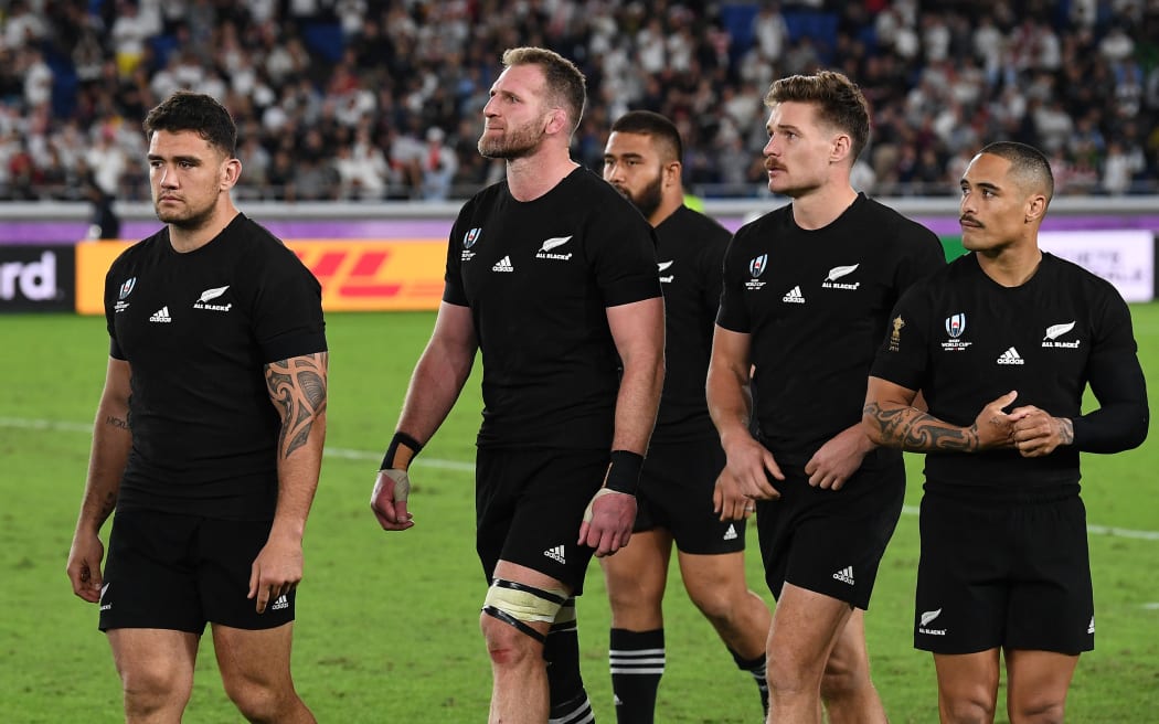 Kieran Read and team mates walk from the field after defeat to England in the 2019 World Cup semi final in Yokohama,