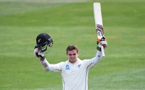 Black Caps opener Tom Latham celebrates his century on day four of the first cricket Test against Sri Lanka at University Oval, Dunedin, New Zealand. Sunday 13 December 2015. Copyright photo: Andrew Cornaga / www.photosport.nz