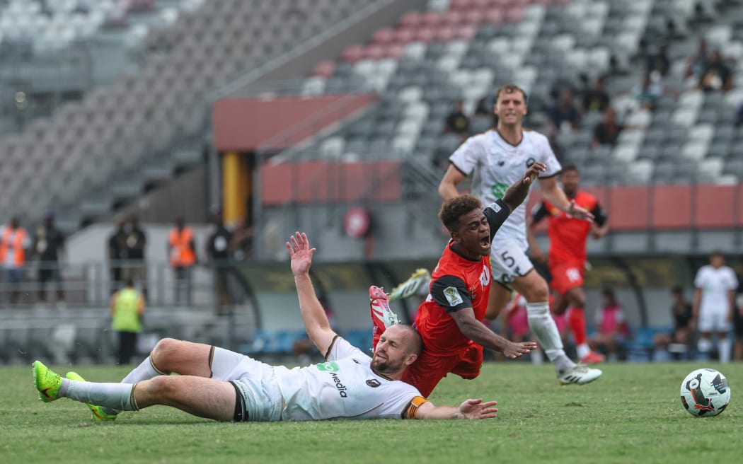 South Island United's Christian Gray is red carded for taking out PNG Hekari FC's John Orobulu. OFC Pro League 2026, PNG Hekari FC v South Island United, Santos National Football Stadium, Papua New Guinea, Saturday 7 February 2026. Photo: Shane Wenzlick / www.phototek.nz