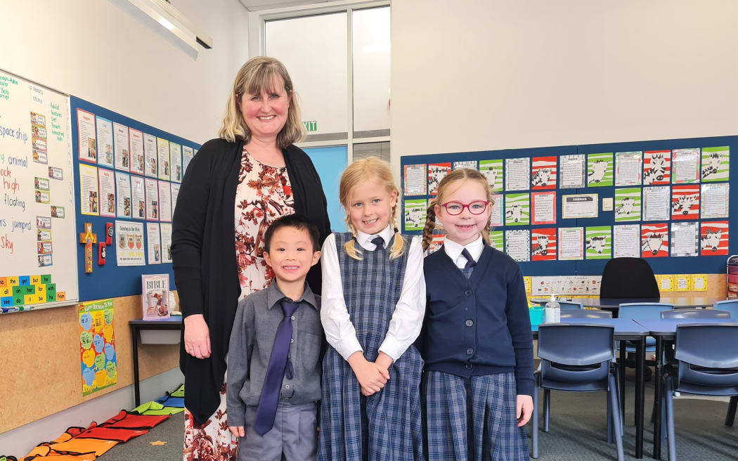 Farmer Time School programme. Teacher Brigid Ladley and some Year 2 students at St Michael's Church School