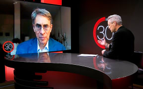 Kenneth Roth appears via remote link in studio for an interview on season 3 of 30 with Guyon Espiner.