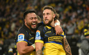 TJ Perenara of the Hurricanes  and Asafo Aumua of the Hurricanes celebrate try. Super Rugby Pacific - Hurricanes v Highlanders at Sky Stadium, Wellington, New Zealand on Saturday 1 June 2024. Mandatory credit: Elias Rodriguez / www.photosport.nz