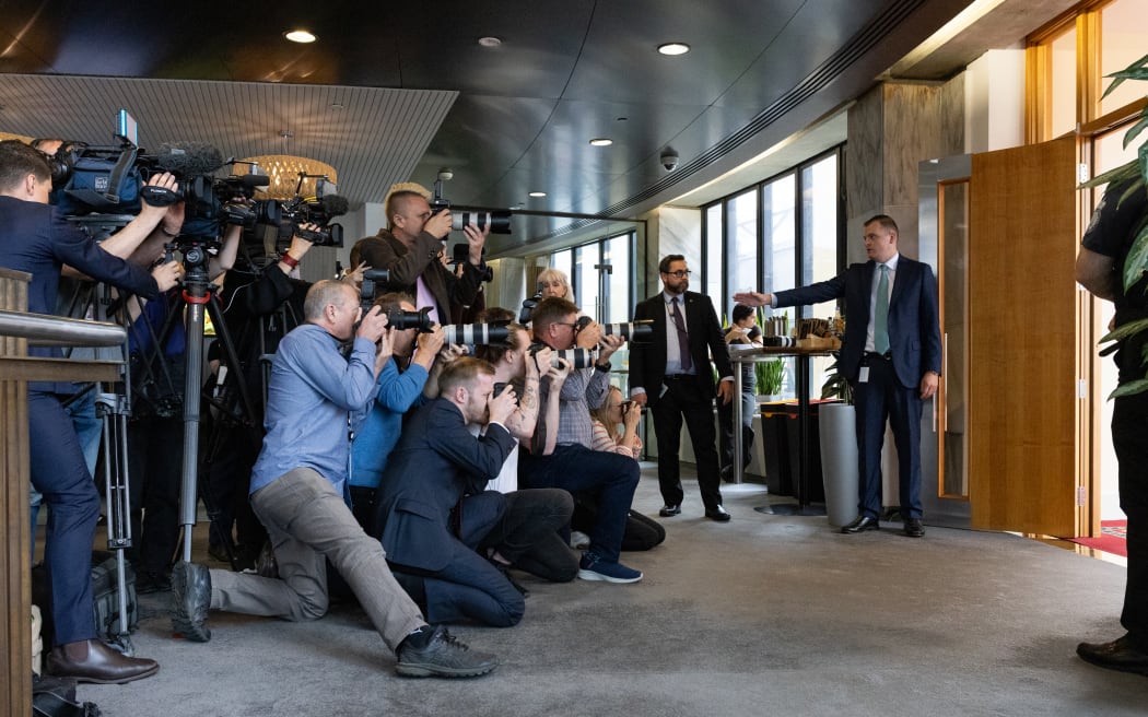 Coalition agreement signing ceremony between Christopher Luxon, David Seymour and Winston Peters.
