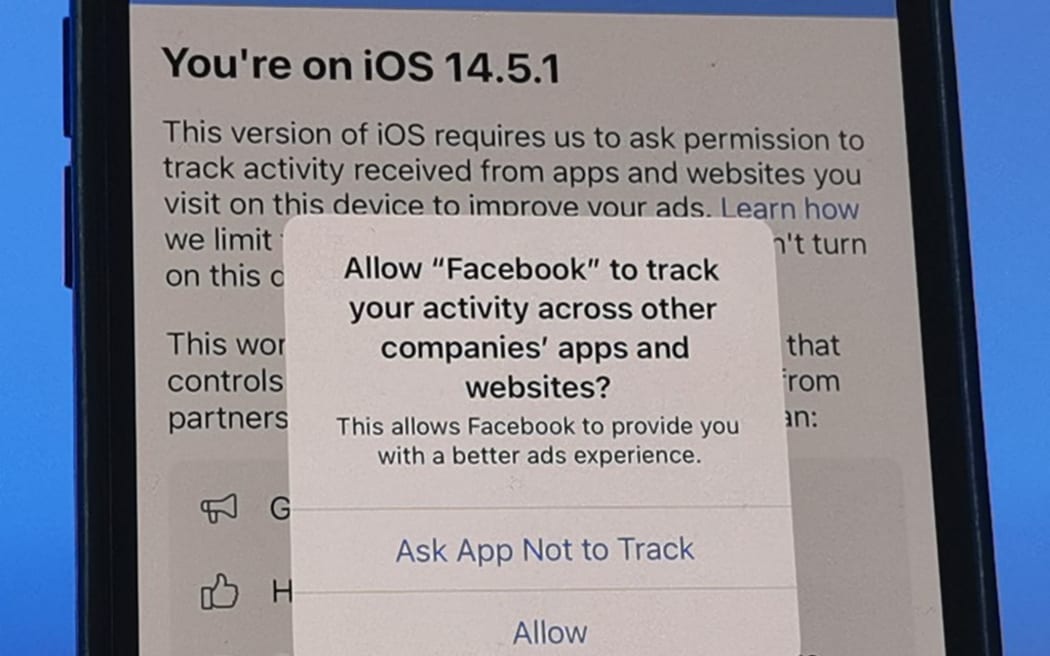 A privacy notice appears on an iPhone 12 under the new iOS 14.5.1 operating system. Developers of an application have to ask for the user's permission to allow cross-app tracking.