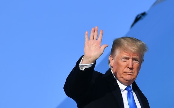 US President Donald Trump makes his way to board Air Force One before departing from Andrews Air Force Base in Maryland on December 7, 2019.