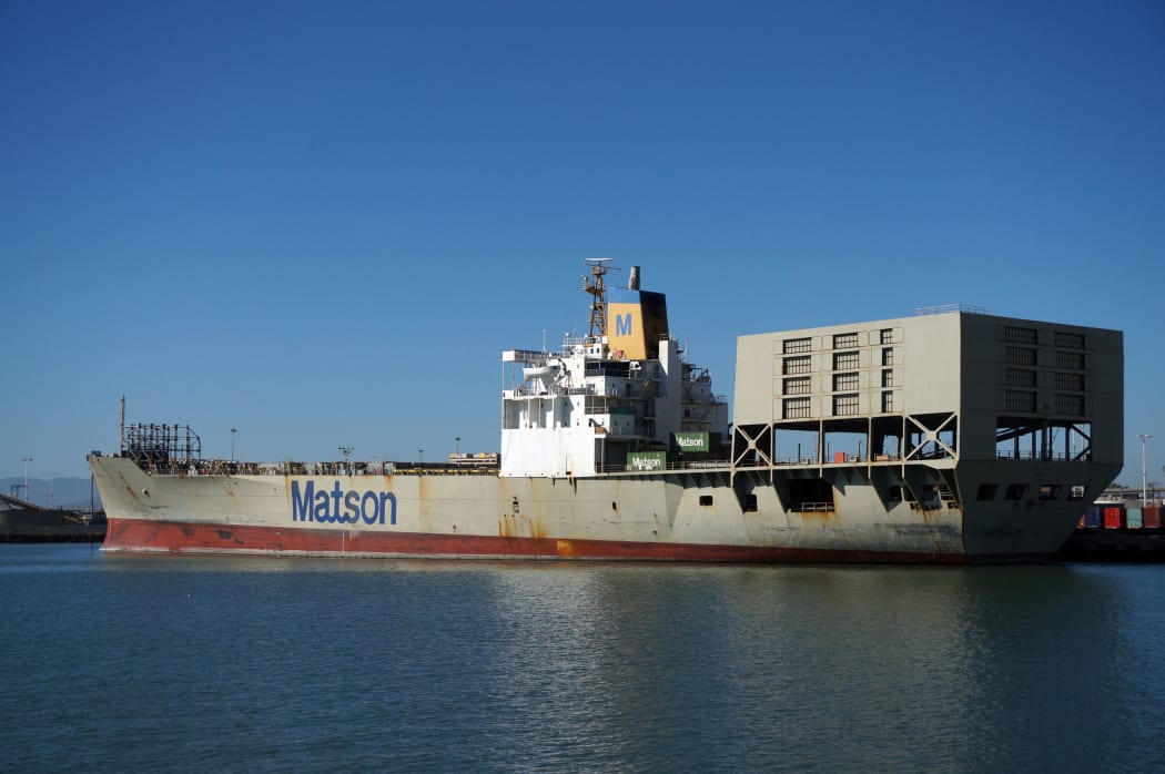 OAKLAND - OCTOBER 12: Matson shipping boat is unloaded by cranes in Oakland Harbor. The fourth busiest container port in the country, it's a major economic engine in the San Francisco Bay Area.