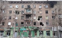 Damaged building in Mariupol as a Russian ultimatum for Ukrainian fighters in the city to surrender expires.