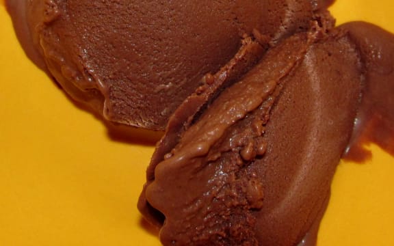 Scoop of chocolate ice cream.