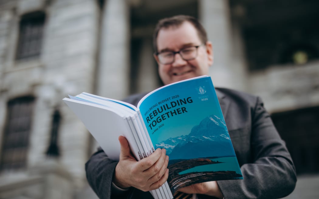 Grant Robertson holding the Budget 2020 ahead of its release.