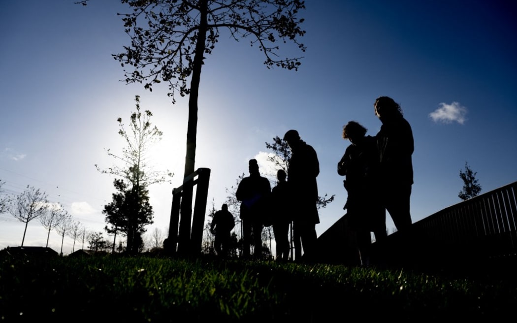 VIJFHUIZEN - Australian relatives at the National Monument MH17. In the court at Schiphol, the court rules in the criminal case against the four men suspected of involvement in the downing of flight MH17. All 298 people on board were killed. ANP ROBIN UTRECHT netherlands out - belgium out (Photo by ANP MAG / ANP via AFP)
