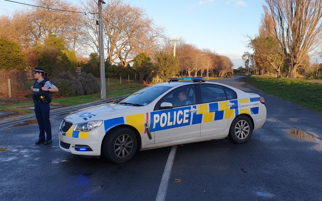 Police at the cordon at Avon Park in Christchurch.