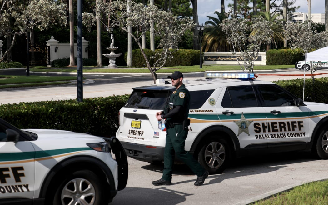 WEST PALM BEACH, FLORIDA - SEPTEMBER 15: Law enforcement secures the area around Trump International Golf Club after an apparent assassination attempt of former President Donald Trump on September 15, 2024 in West Palm Beach, Florida. The FBI and U.S. Secret Service, along with the Palm Beach County Sheriff's office, are investigating the incident, which the FBI said "appears to be an attempted assassination of former President Trump' while he was golfing at Trump International Golf Club.   Joe Raedle/Getty Images/AFP (Photo by JOE RAEDLE / GETTY IMAGES NORTH AMERICA / Getty Images via AFP)