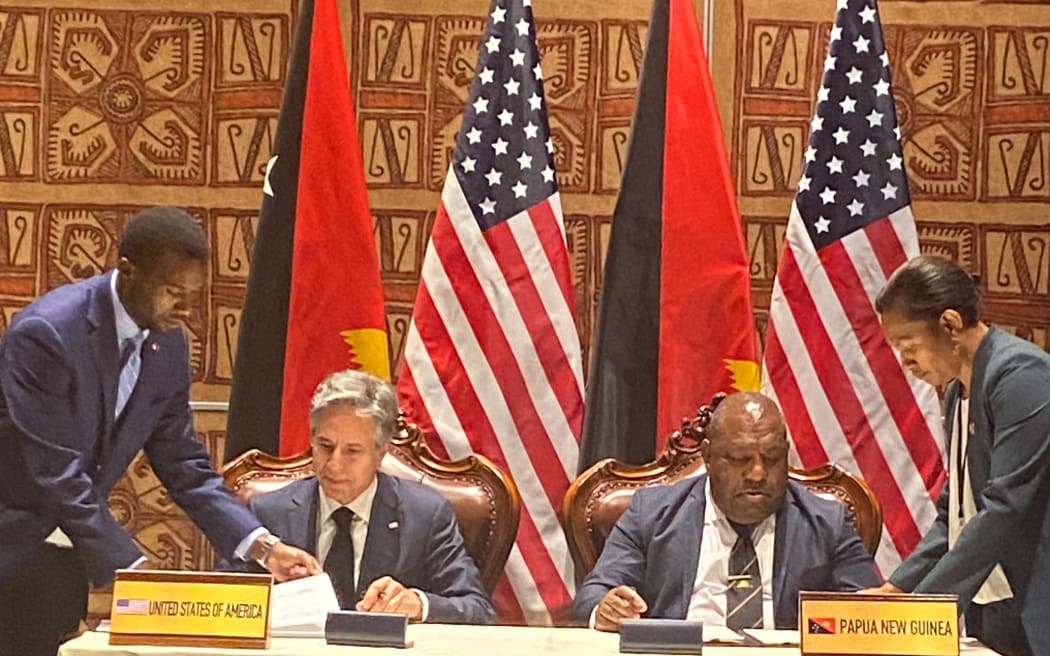 US Secretary of State Antony Blinken and PNG Defence Minister, Win Barki Daki, sign a new bilateral defense cooperation agreement.