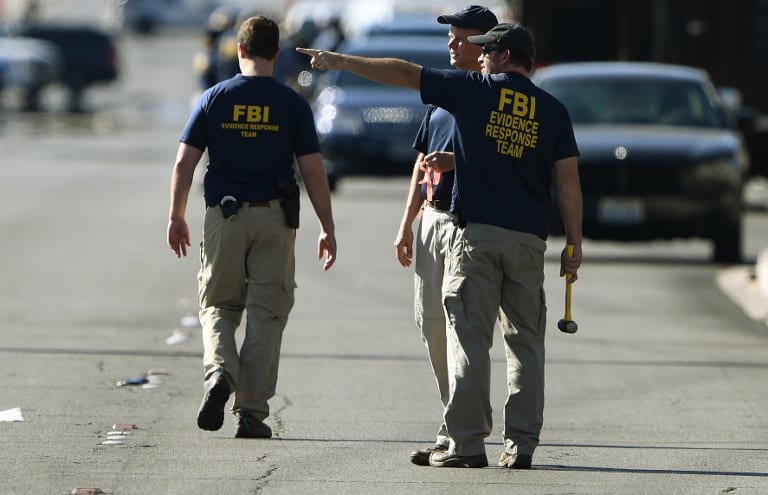 FBI investigators work outside the Route 91 festival venue.