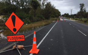 Mill Road in Takanini is closed due to flooding.