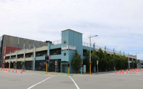 The existing, secure staff carpark on Antigua Street was meant to have two additional storeys added by October last year.