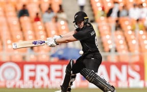 Brooke Halliday hits out during the White Ferns innings against India in the third ODI match of their series in Ahmedabad.