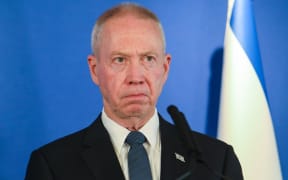 Israeli Minister of Defence Yoav Gallant delivers a statement to the press at the Israel Aerospace Industries (IAI) headquarters near the Ben Gurion airport in Tel Aviv, on March 9, 2023. - Austin, on a visit to Israel, expressed concerns on March 9 about Jewish settler violence against Palestinians and warned against acts that could trigger more insecurity. (Photo by GIL COHEN-MAGEN / AFP)