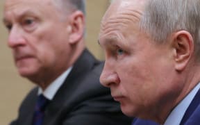 Russian President Vladimir Putin, accompanied by Secretary of Russia's Security Council Nikolai Patrushev, meets with secretary general of Japan's National Security Council at the Novo-Ogaryovo residence outside Moscow on January 16, 2020. (Photo by Mikhail KLIMENTYEV / SPUTNIK / AFP)