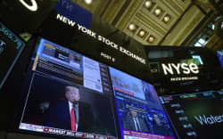 Traders work on the floor of the New York Stock Exchange (NYSE) in the Financial District in New York City on March 4, 2025. (Photo by TIMOTHY A. CLARY / AFP)