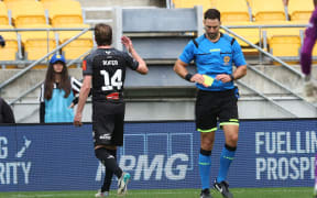 Phoenix captain Alex Rufer walks from the field after being sent off during the A-League - Wellington Phoenix v Brisbane Roar FC at Sky Stadium, Wellington on the 31 March 2024. © Copyright image by Marty Melville / www.photosport.nz