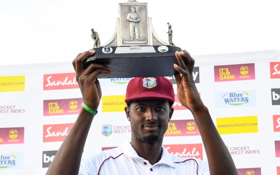 Jason Holder of West Indies with the Wisden trophy 2019.