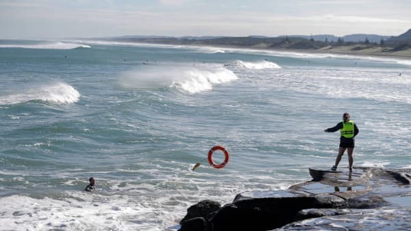 A demonstration on using public rescue equipment at Muriwai Beach.