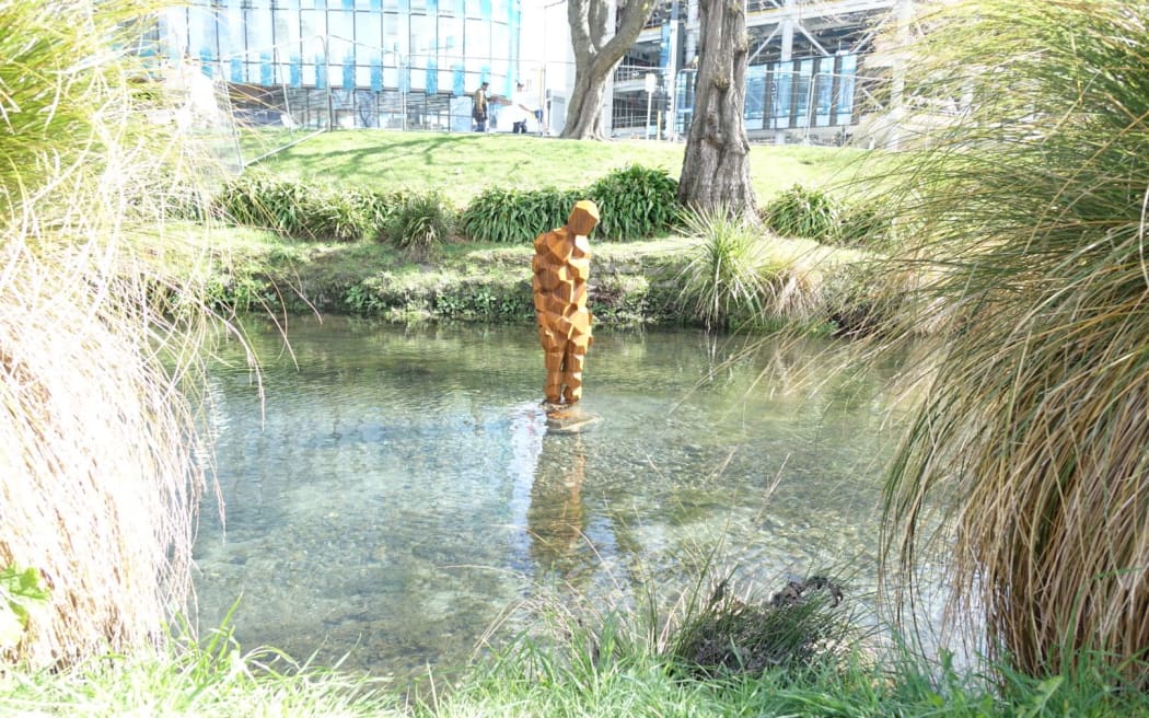 The Anthony Gormley scuplture in the Avon River.
