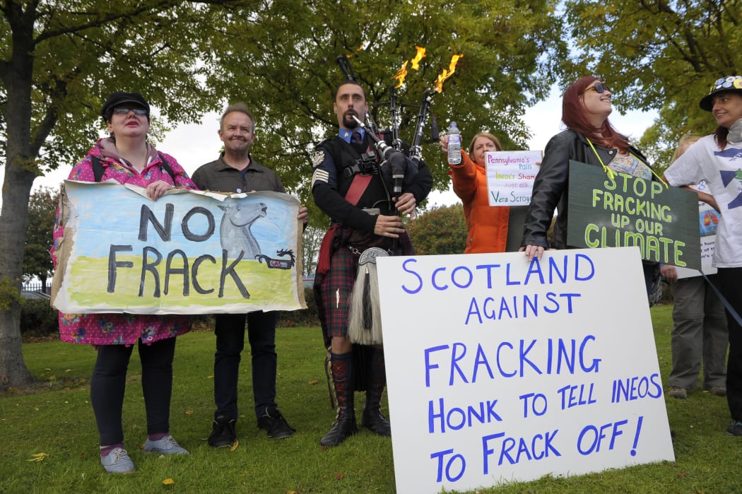 Scottish demonstrators protest against Ineos, which holds fracking exploration licences across 1800 square km of the country