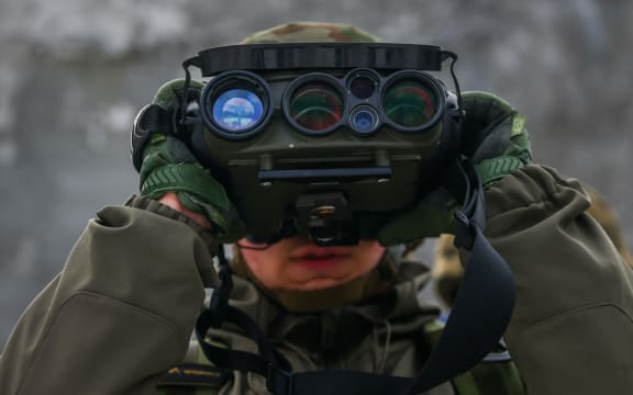 Thermal binoculars are used during 'Train With The Army' military training run by 16th Airborne Battalion in Krakow, Poland on Fabruary 4, 2023. This free-of-charge initiative of the Polish Ministry of National Defense aims to provide citizens with basic military skills and encourage additional volunteers to join the country’s armed forces. During classes, military instructors teach participans weapons handling, survival fundamentals, and first medical aid. The program has gained a lot of interest among civilians during the ongoing Russian invasion on Ukraine. (Photo by Beata Zawrzel/NurPhoto) (Photo by Beata Zawrzel / NurPhoto / NurPhoto via AFP)